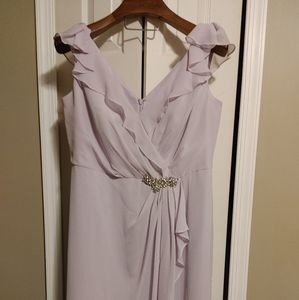 Flowy periwinkle gown with brooch